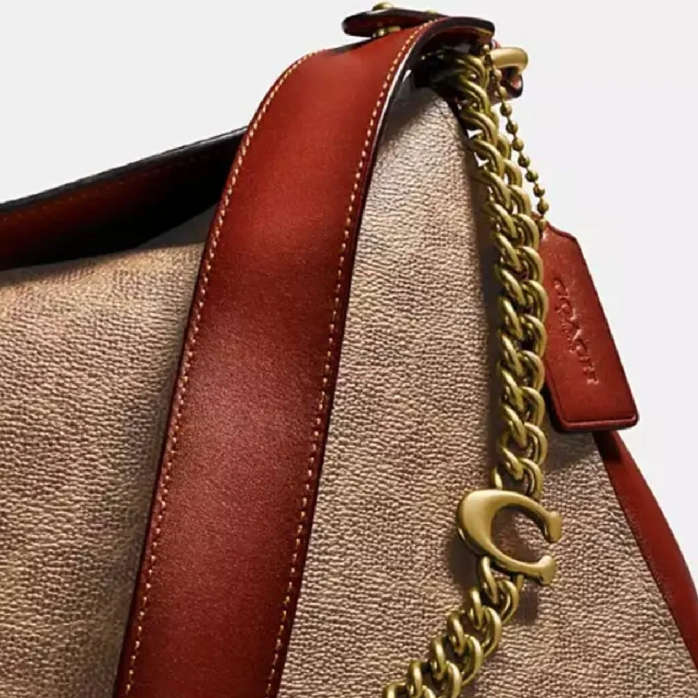 Coach Signature Canvas Crossbody Bag with Tan and Rust Accents - Picture 6 of 7